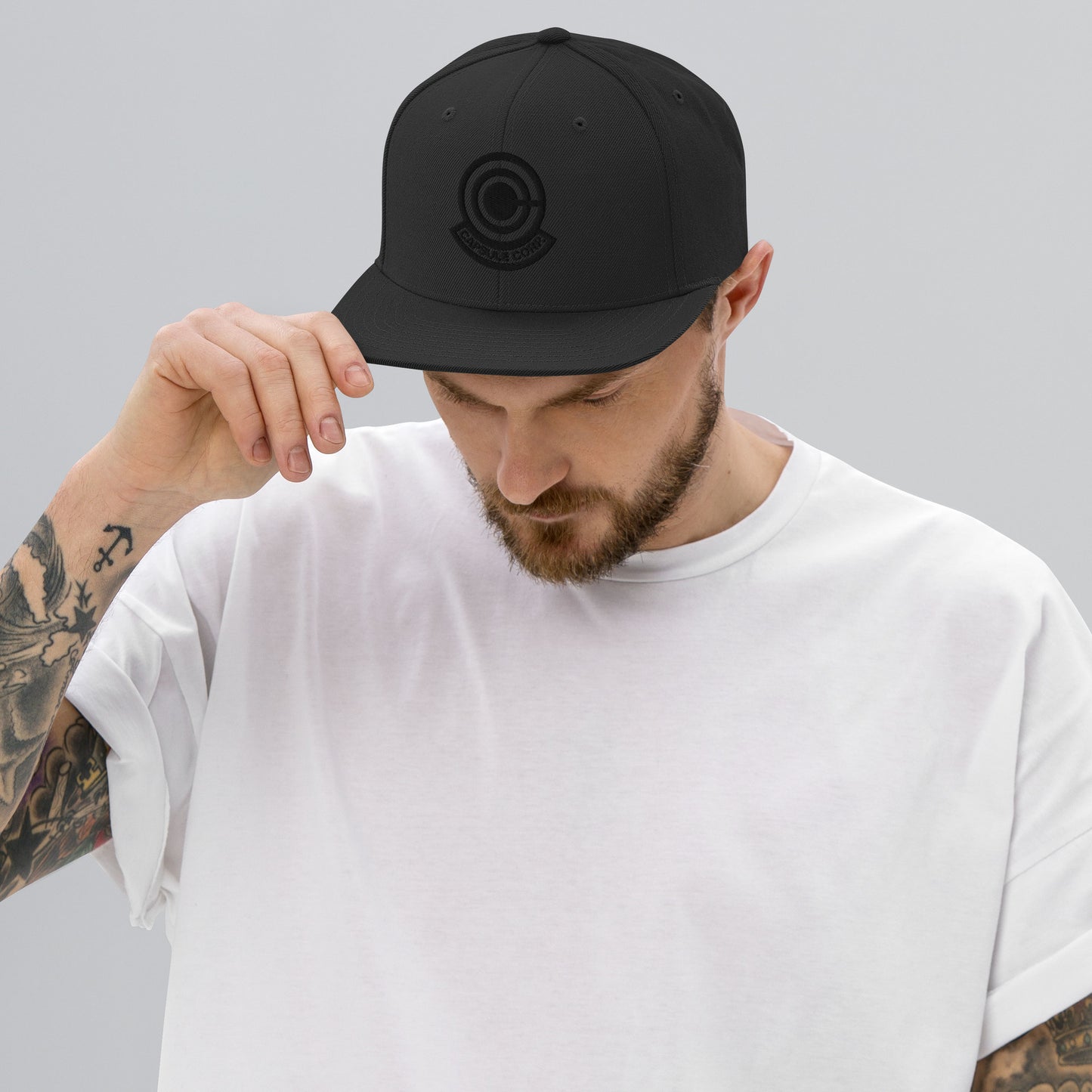 Capsule Snapback Hat (Black Logo)