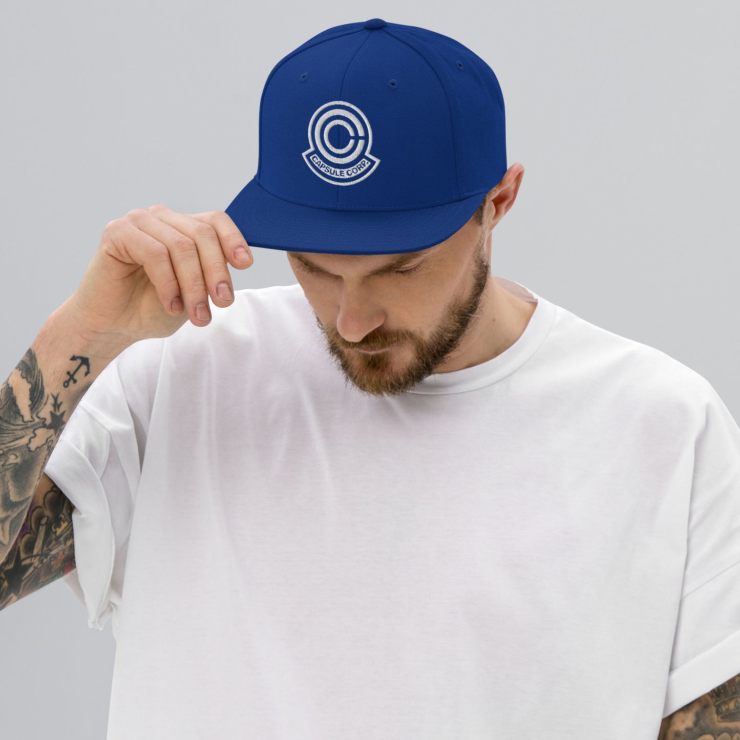 Capsule Snapback Hat (White Logo)